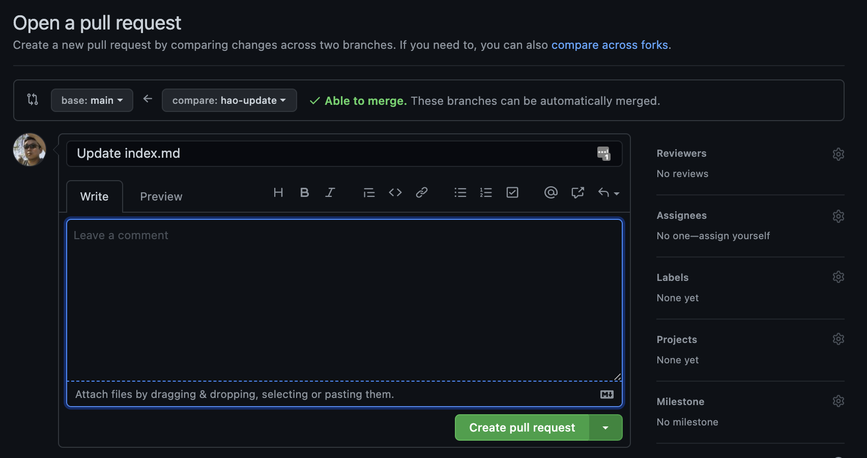 The GitHub interface for creating a Pull Request. The important elements are the selection of the 'base' branch that will take the merge, the 'compare:' branch that has the new commits to be merged, the title of the pull request (with the text 'Update index.md'), the text box (which is empty), and the green button for 'Create pull request'.